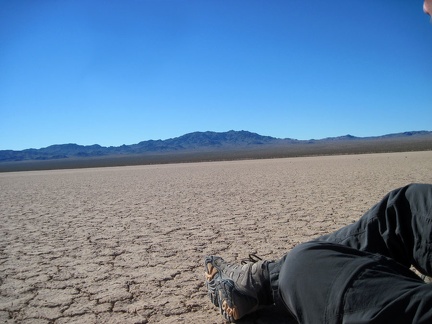 I sit down for a few minutes on the hard, crackled surface of Broadwell Dry Lake