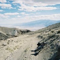 I park the bike and go for a walk up the big hill to my right to take in the views of Death Valley below
