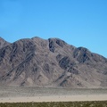 If I zoom in on Broadwell Dry Lake, I see a number of ant-like items on the playa that might be a convoy of 4WD vehicles