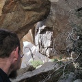Under boulders at Eagle Rocks, I peer out toward the sunshine