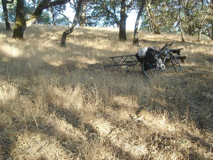 I finally make it to the Yerba Buena campsite with its picnic tables hidden in the shade of many big old oak trees.