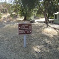 The sign on Coit Road near the Pacheco Camp cabin says that it's 16 miles to Park Headquarters.