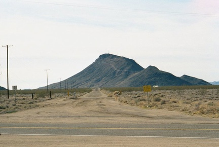 From "downtown" Goffs, California, a dirt road called Mountain Springs Road runs south, connecting to Essex