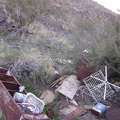 An ugly pile of debris sits on the hillside just above my chosen campsite near Indian Springs