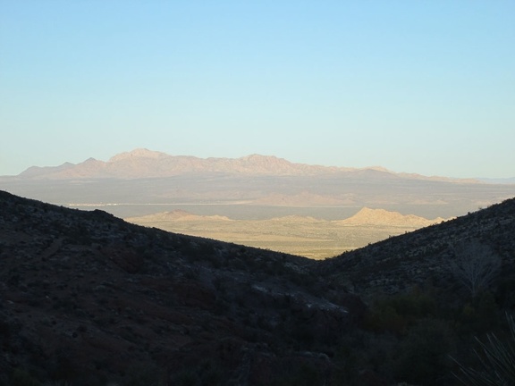 It's about 30 minutes before sunset, perfect time to be climbing a big hill in the Mojave Desert