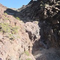 I take a look at a small dry waterfall in this unnamed Sleeping Beauty canyon that I just climbed around
