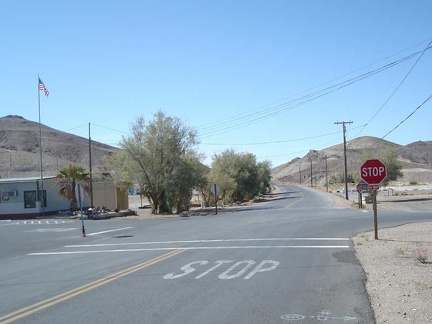 The stop sign in Tecopa Hot Springs village, looking back toward Baker